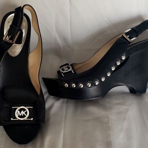Authentic Michael Kors Wedge shoes with buckle to adjust, silver hardware